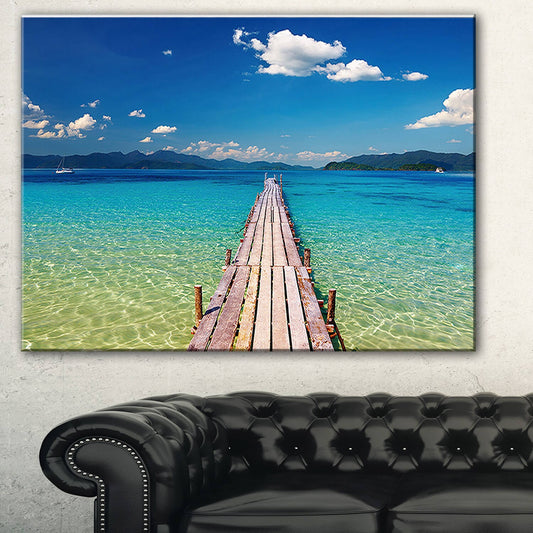 Design Art Wooden Pier in Tropical Paradise Photographic Print on Wrapped Canvas, Size: 30 inch H x 40 inch W x 1 inch D, Blue TMF1_J0TSE29